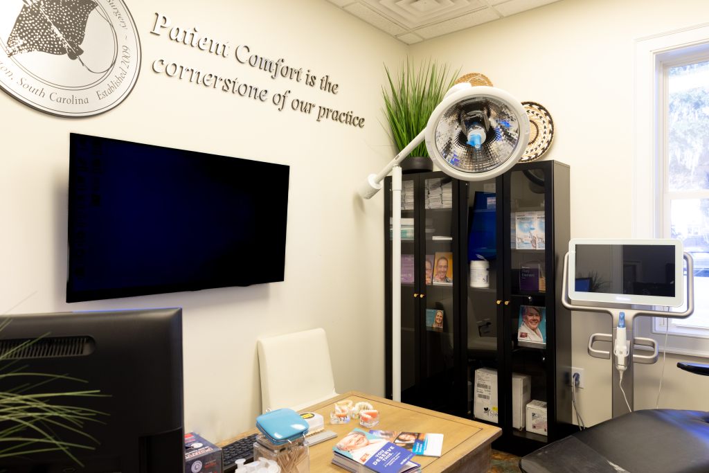 Large inside look at Hehr Oral Surgery office with desk and instruments.
