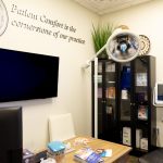 Large inside look at Hehr Oral Surgery office with desk and instruments.
