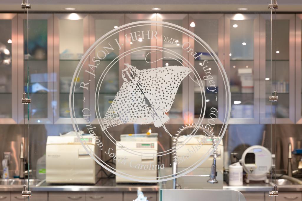 Small image of Hehr Oral Surgery emblem on entrance doors.